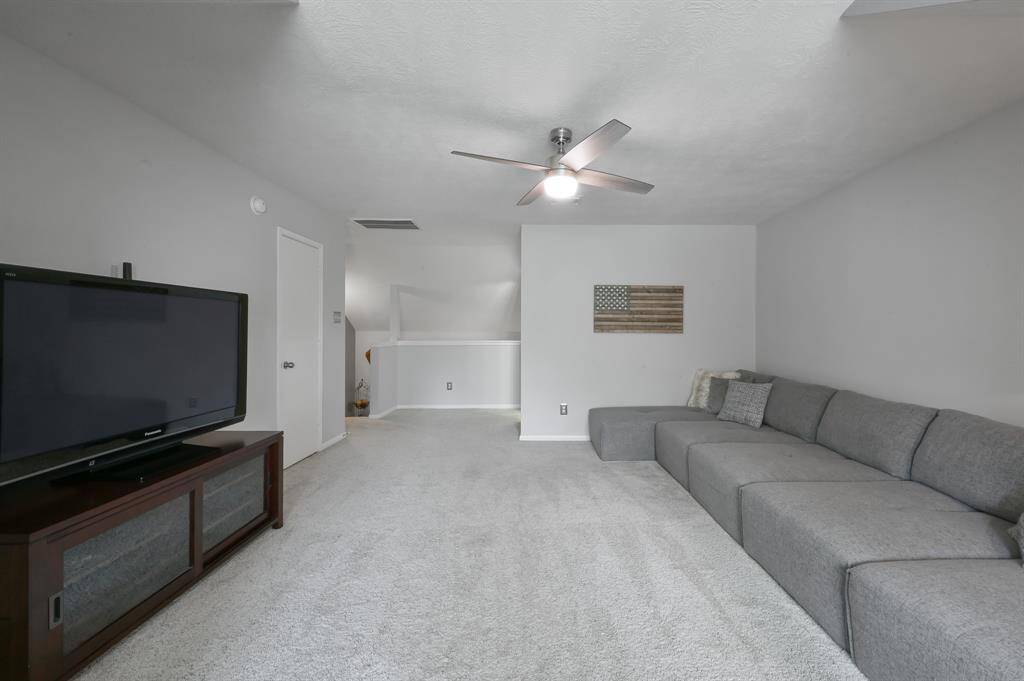 Game room features added walk-in storage closet and multiple walk-in access to attic.