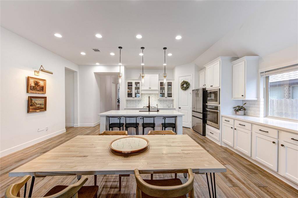 Plenty of cabinets with stunning quartz countertops .