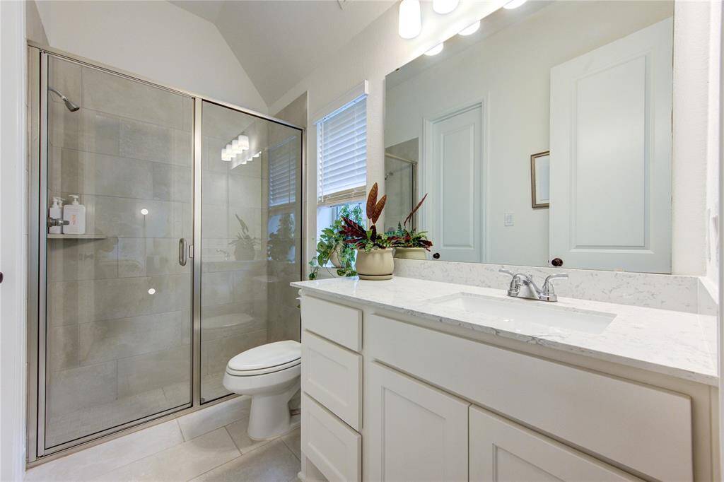 One of the two secondary full bathrooms