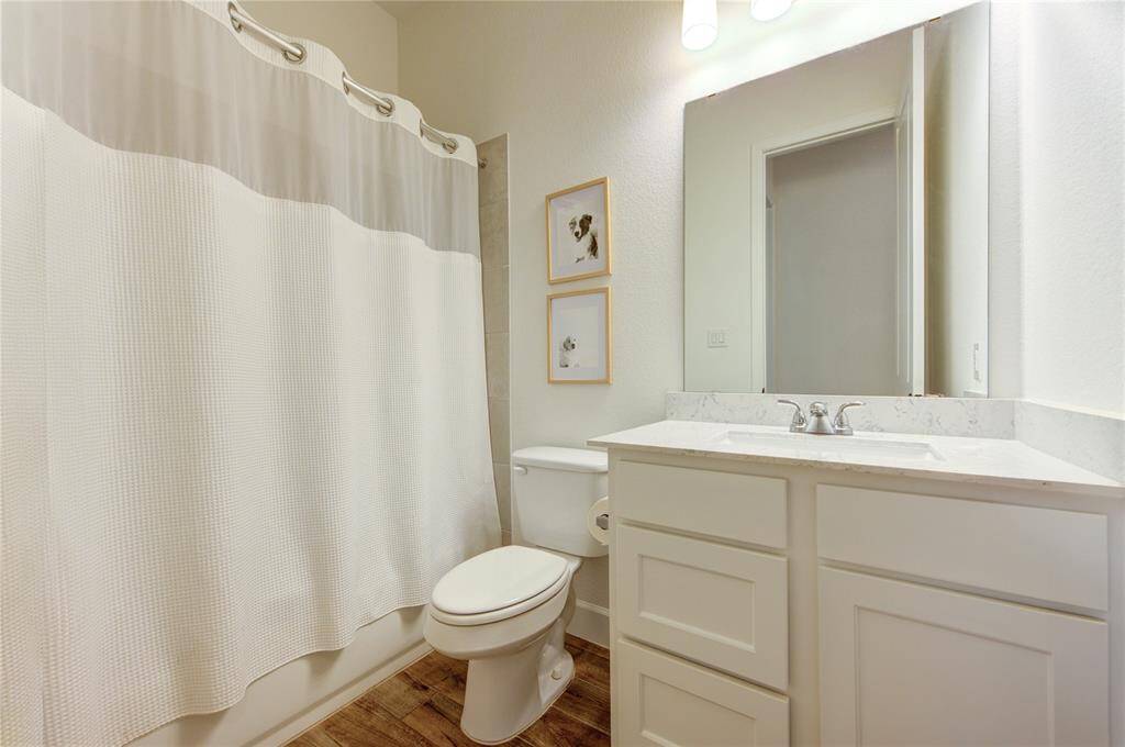 One of the two secondary full bathrooms