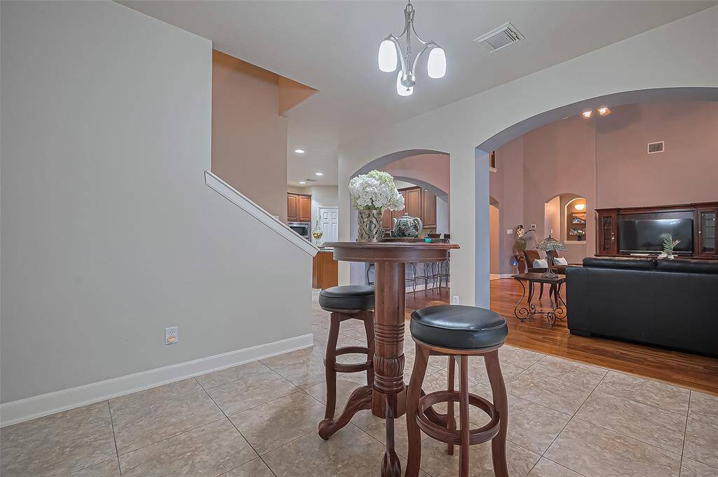 Next to the breakfast area there is a staircase leading to the game room.