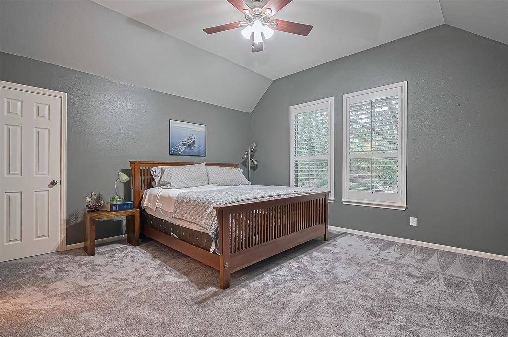 One of the secondary bedrooms upstairs also has plantation shutters.