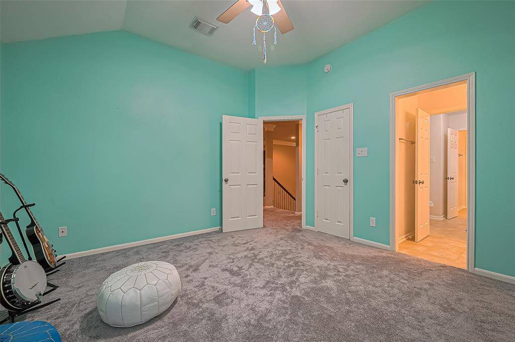 Another view of the bedroom with the walk in closet.