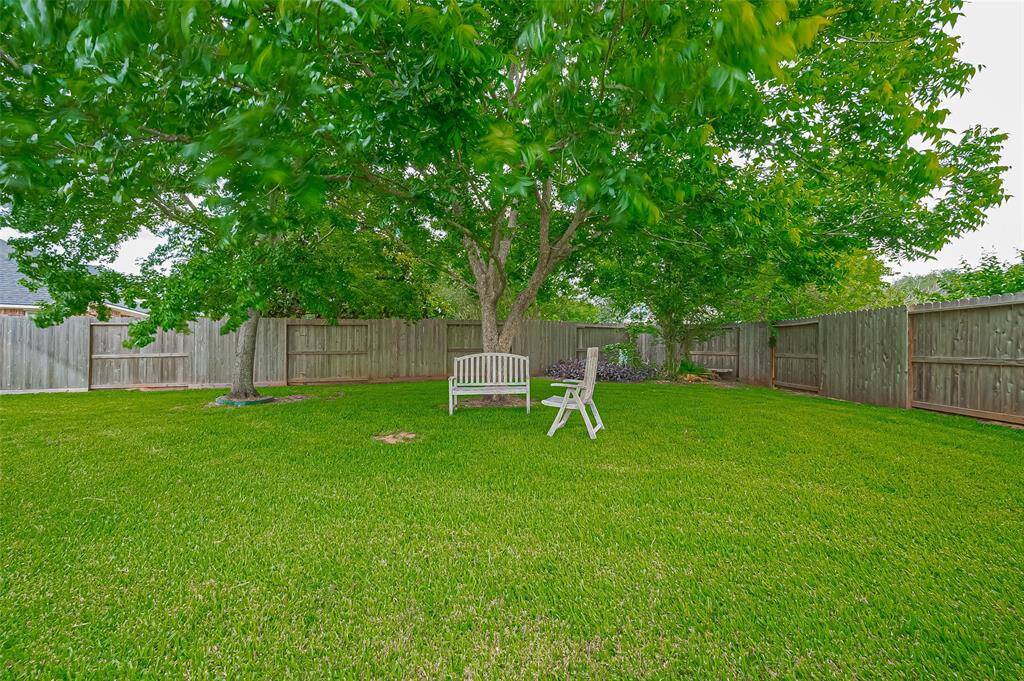 The left side of the garden also extends to a gardening area.