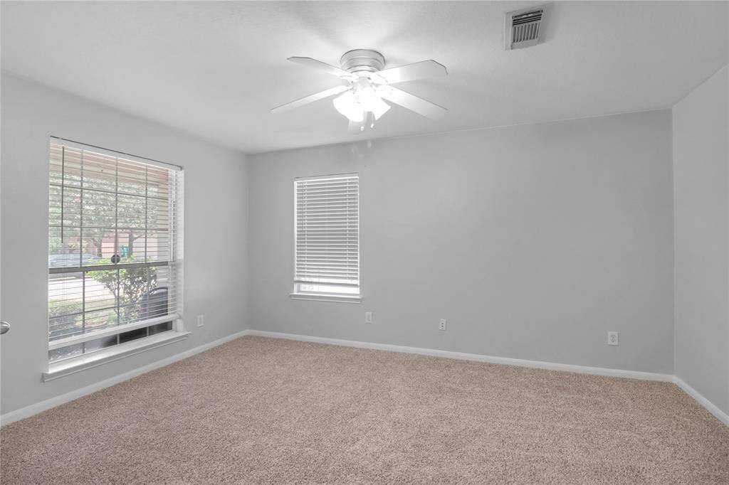 Office/Flex room with a view of the windows in that room