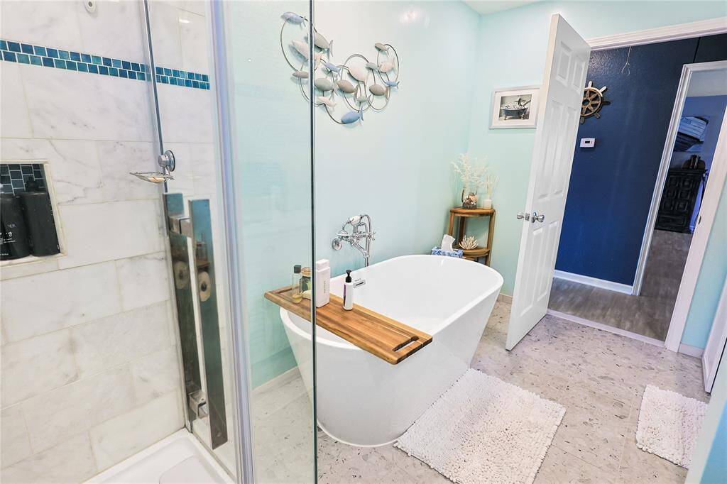 Come home and wash the day away in your spa-like bathroom's very own soaking tub.