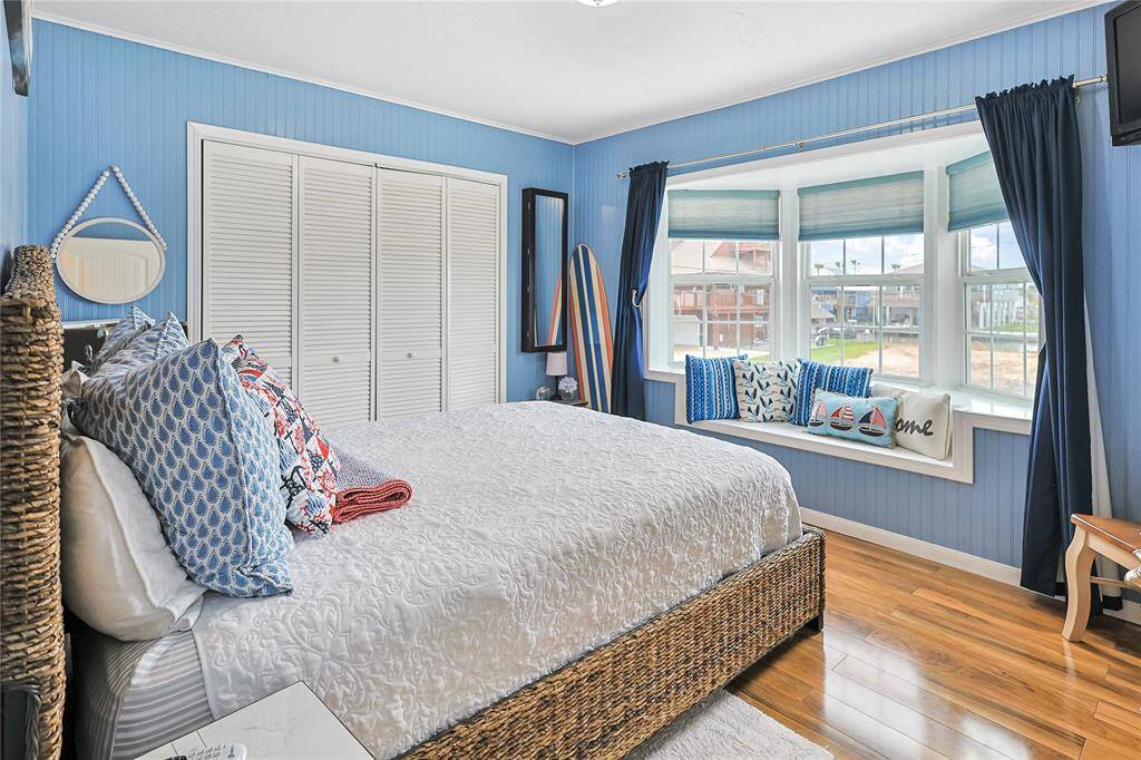 This bedroom offers a large bay window with seating bench and large closet for all your storage needs.