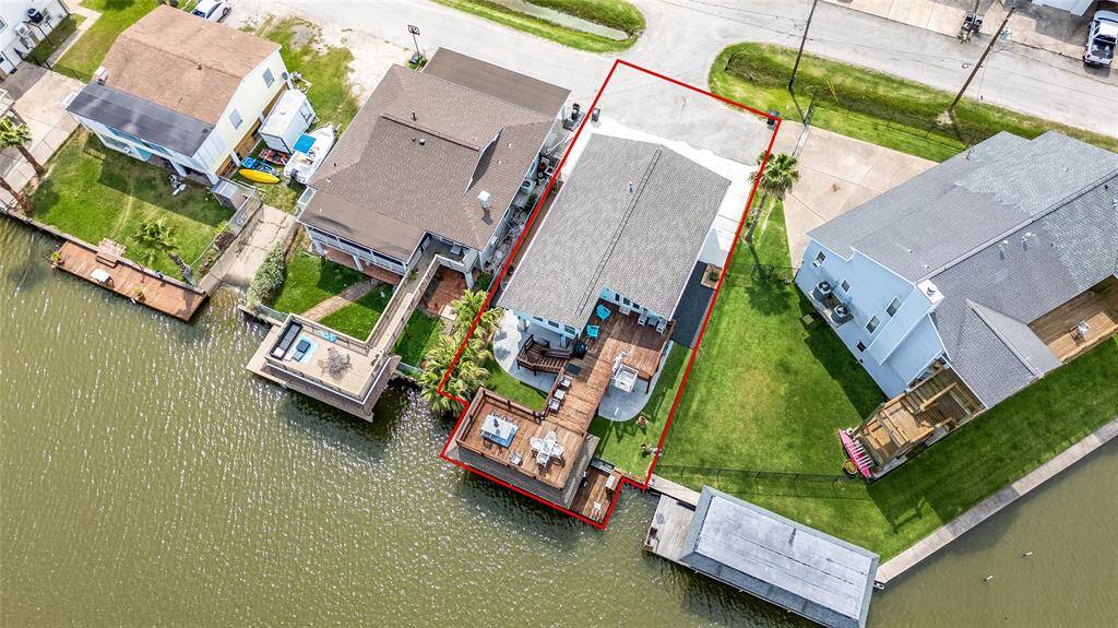 At the end of the street, enjoy privacy and exclusivity on the water in this beautiful home at the end of the canal.