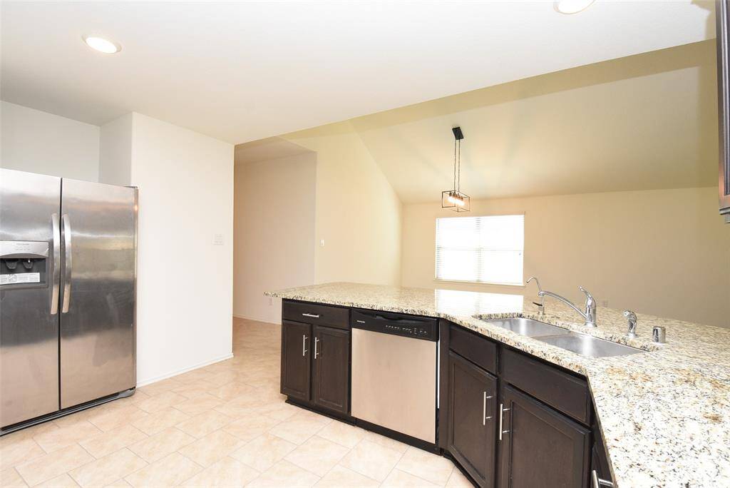 Kitchen has a walk-in pantry too!
