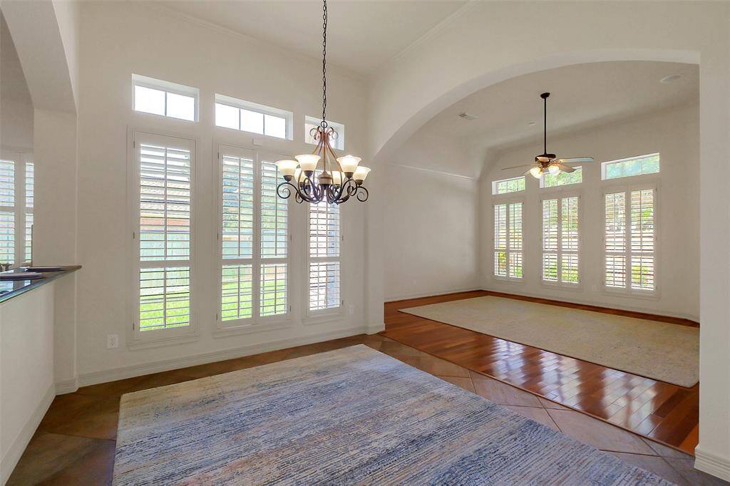 The family dining area sits between the family den and the kitchen.