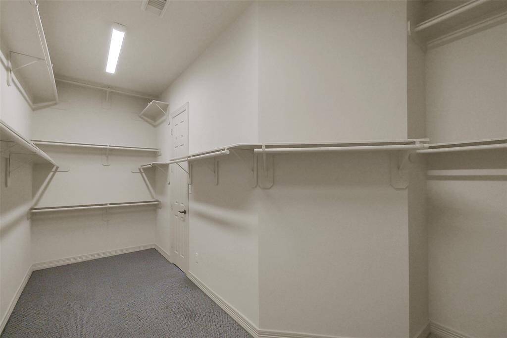 Large walk in primary closet.