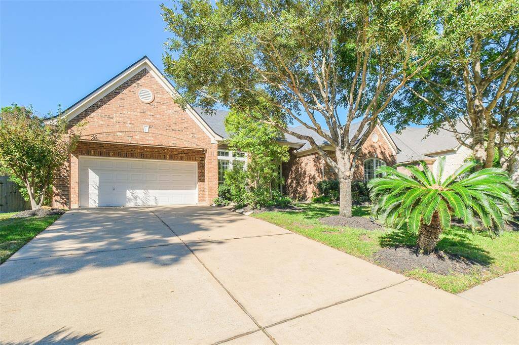 3 car tandem garage with extra parking on the driveway.