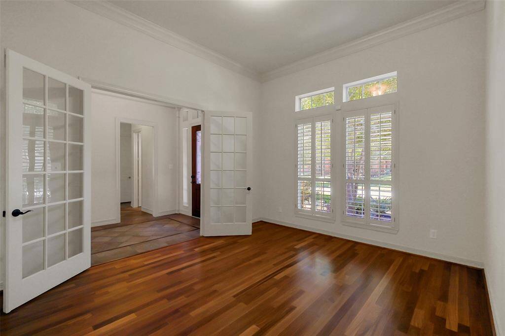 Private study with French Doors for privacy, overlooks the front of the home.