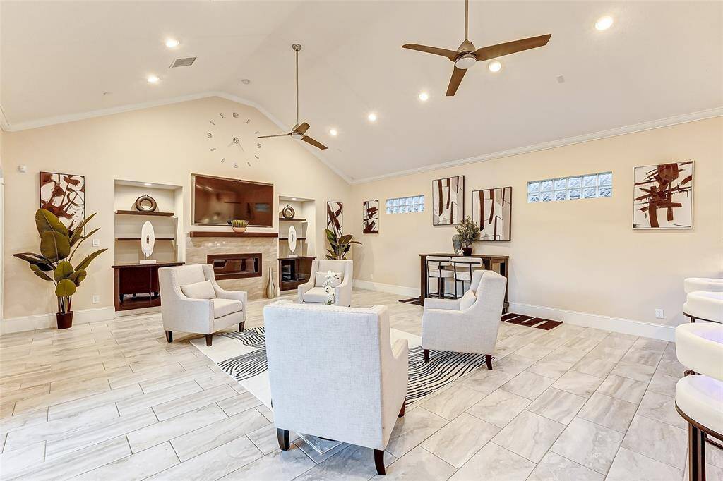 This spacious family room features a romantic gas fireplace and plenty of room for large comfortable furnishings. What a great spot to cozy up by the fire and unwind. Breathe, you are home now.