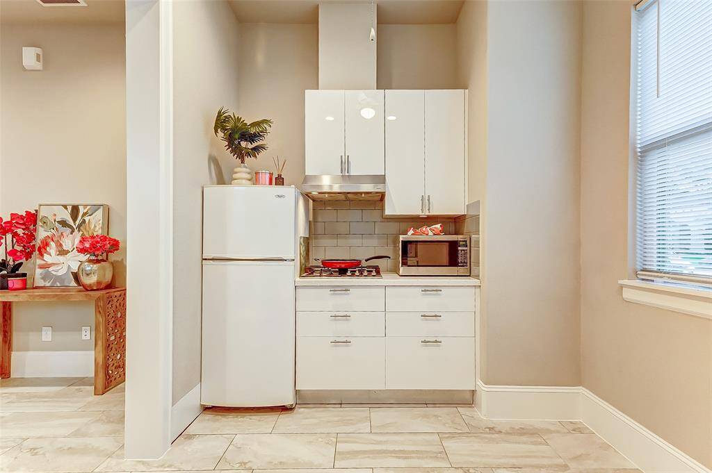 Separate Apartment features kitchenette and a living area.