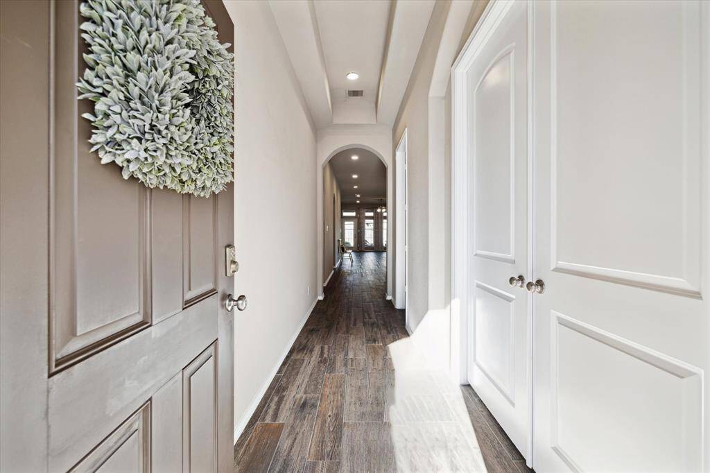 This 6 year young Perry home is waiting for you! Conveniently located in the beautiful community of Harvest Green just off 99 and 90 in Richmond, Texas.