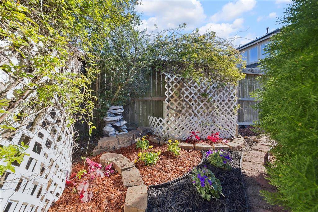 There are hidden gardens at every turn. All freshly mulched and lined with foot paths.