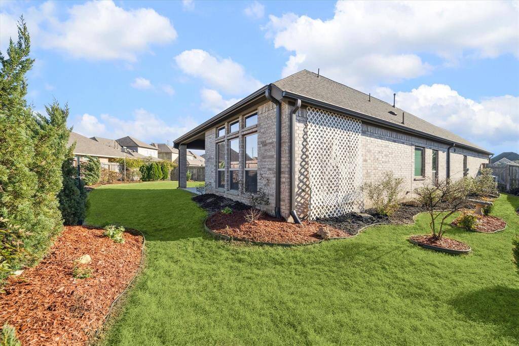 This is a corner, premium lot that is highly sought after because of the additional space it offers. This is an exception home with a magical backyard.