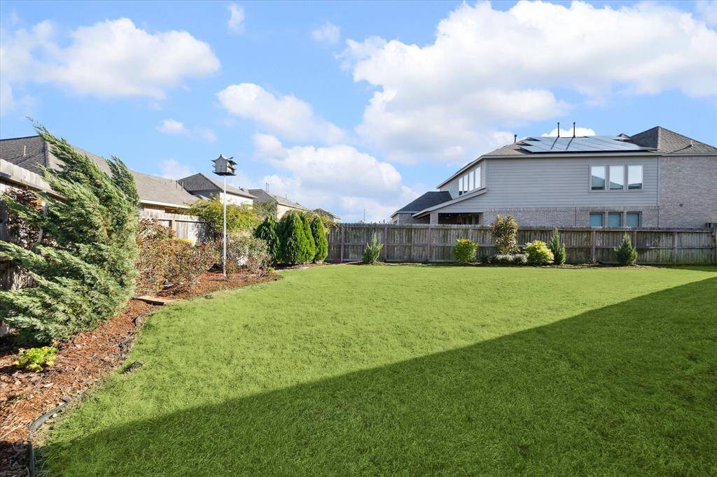 Another yard view and view of the Purple Martin house. Look at this beautiful lush lawn!