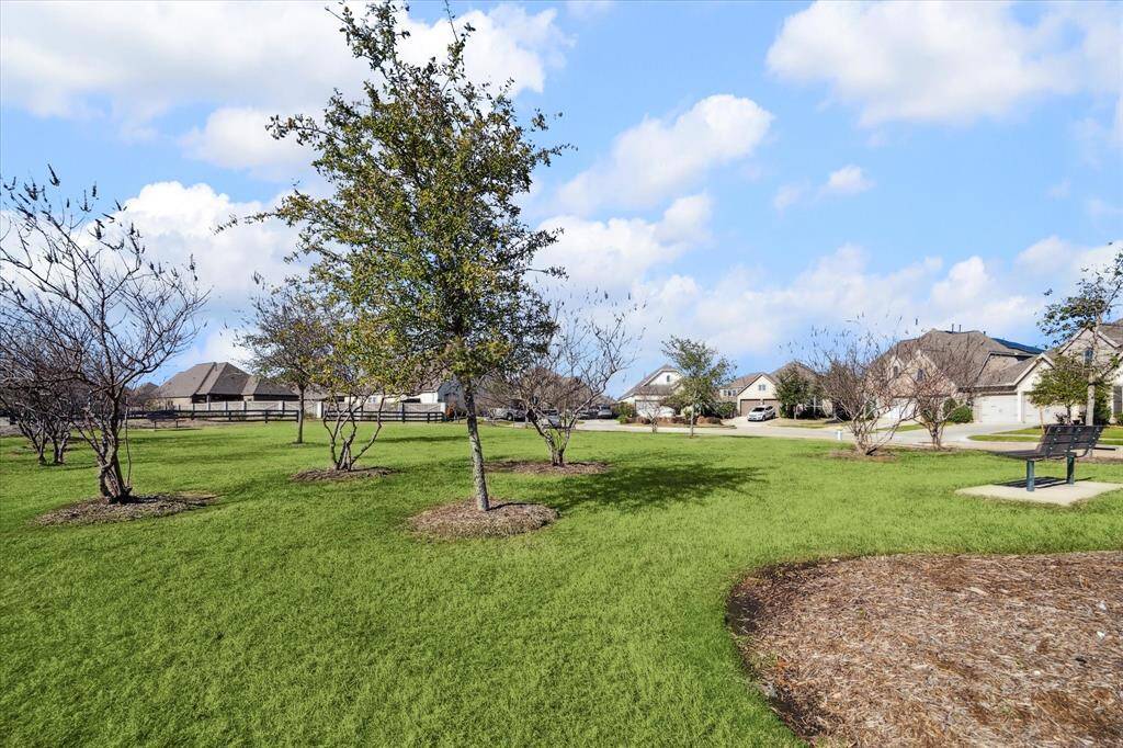 As you approach your turn onto Fresh Bail you can see the common area where herbs are grown, and residents can harvest them. These gardens exist throughout Harvest Green.