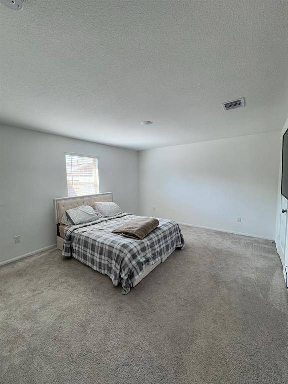 Spacious primary bedroom