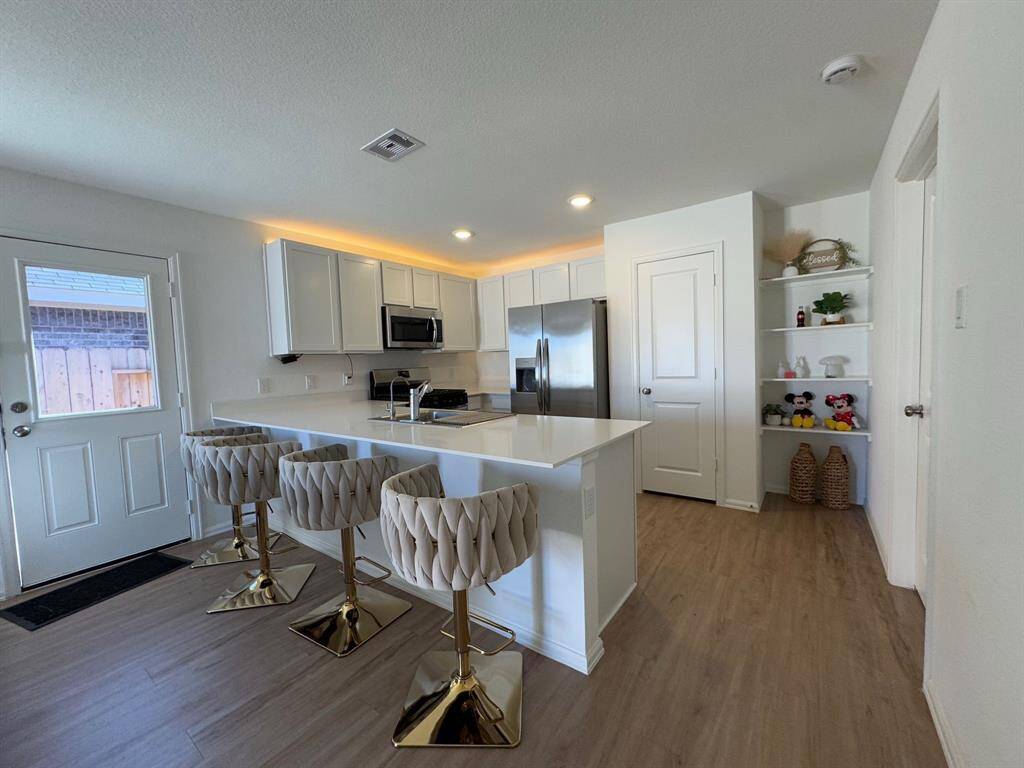 There is plenty of counter space to enjoy your morning coffee and breakfast.