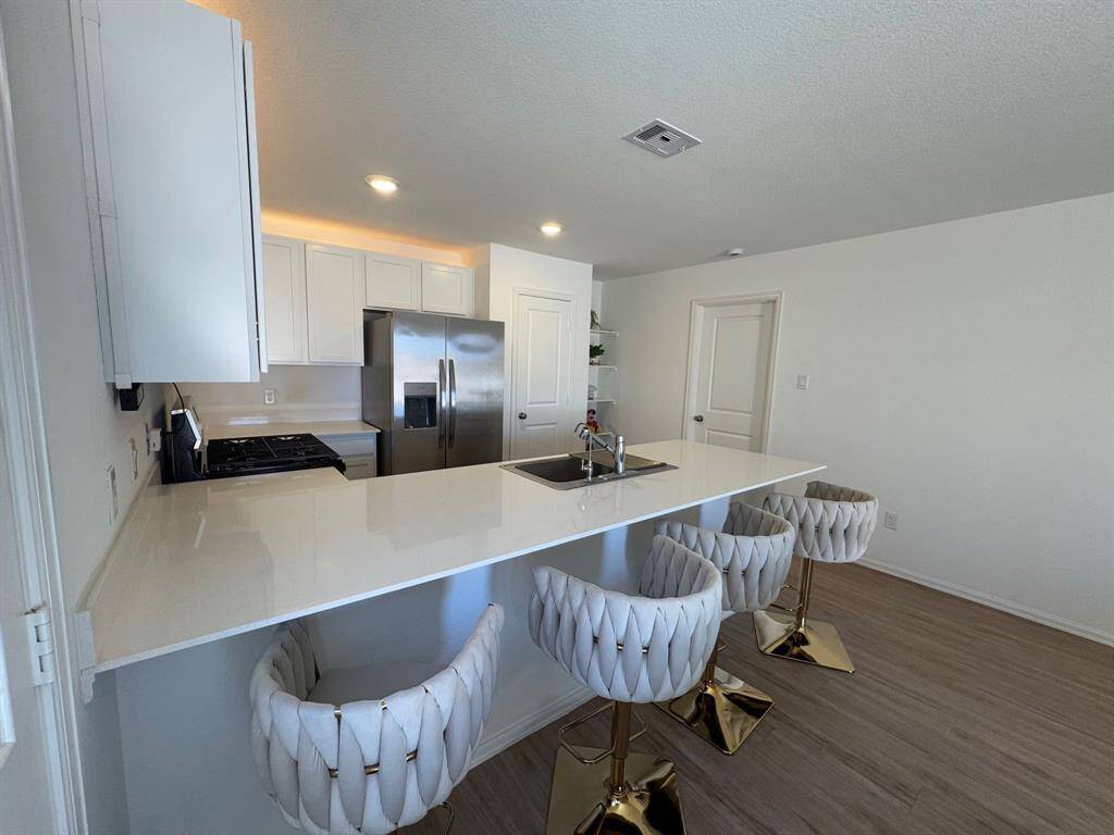Clean-lined quartz countertop.