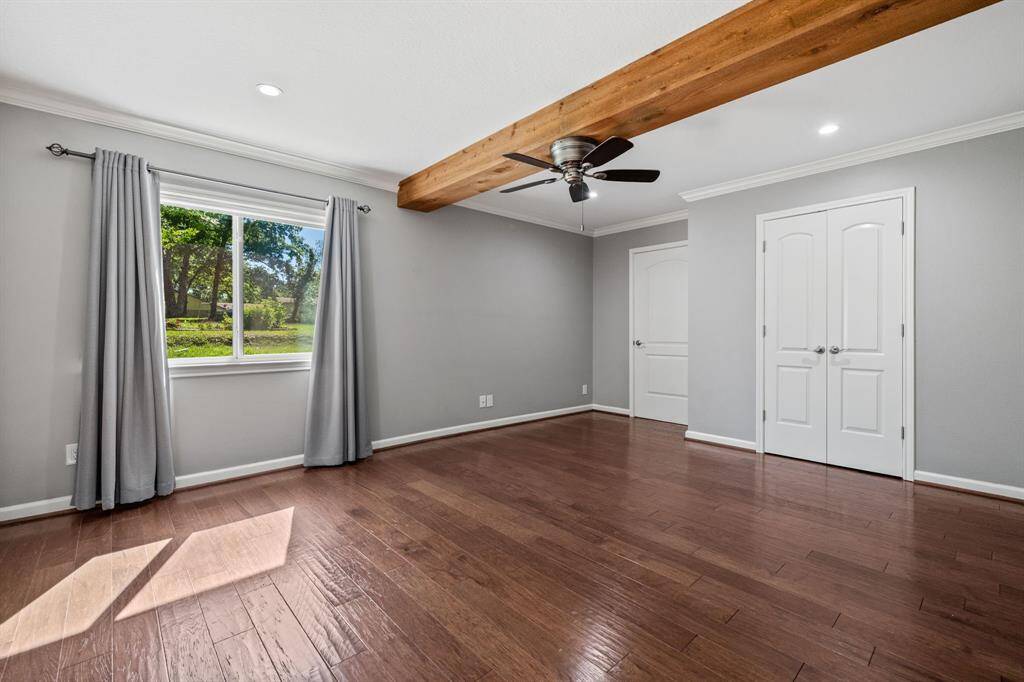 Primary bedroom. Double doors open to the spacious closet; single door leads to the en-suite.