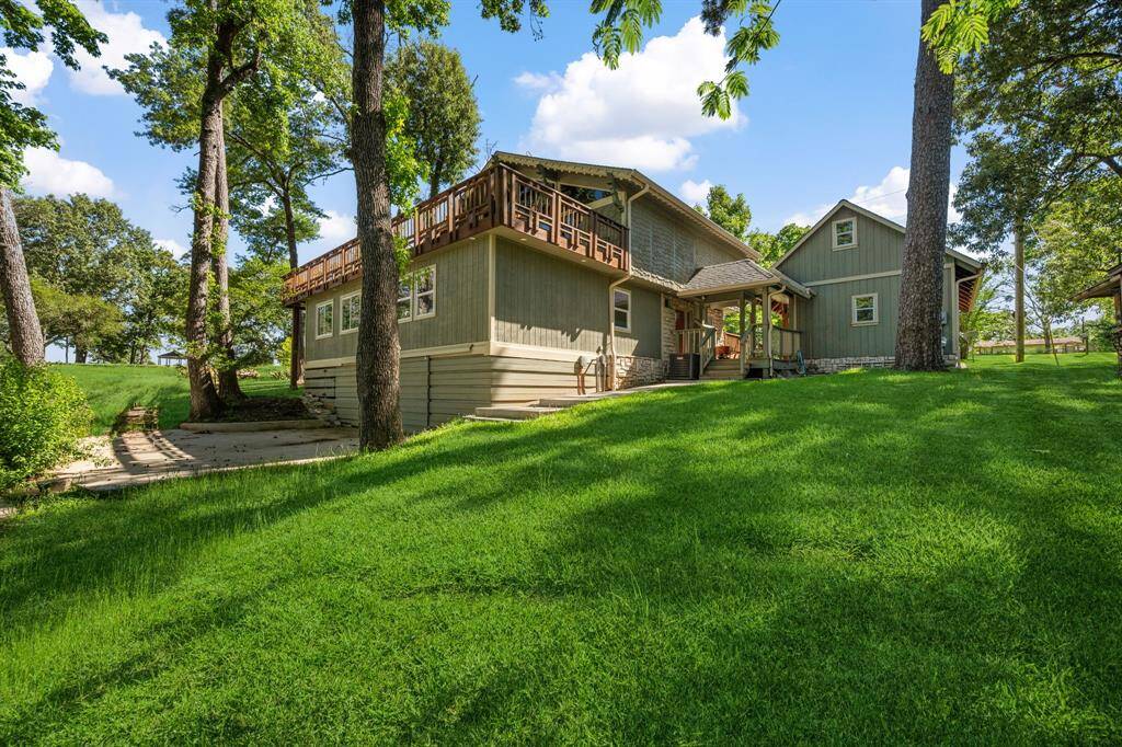 Rear of home. Huge under home storage area off the patio.