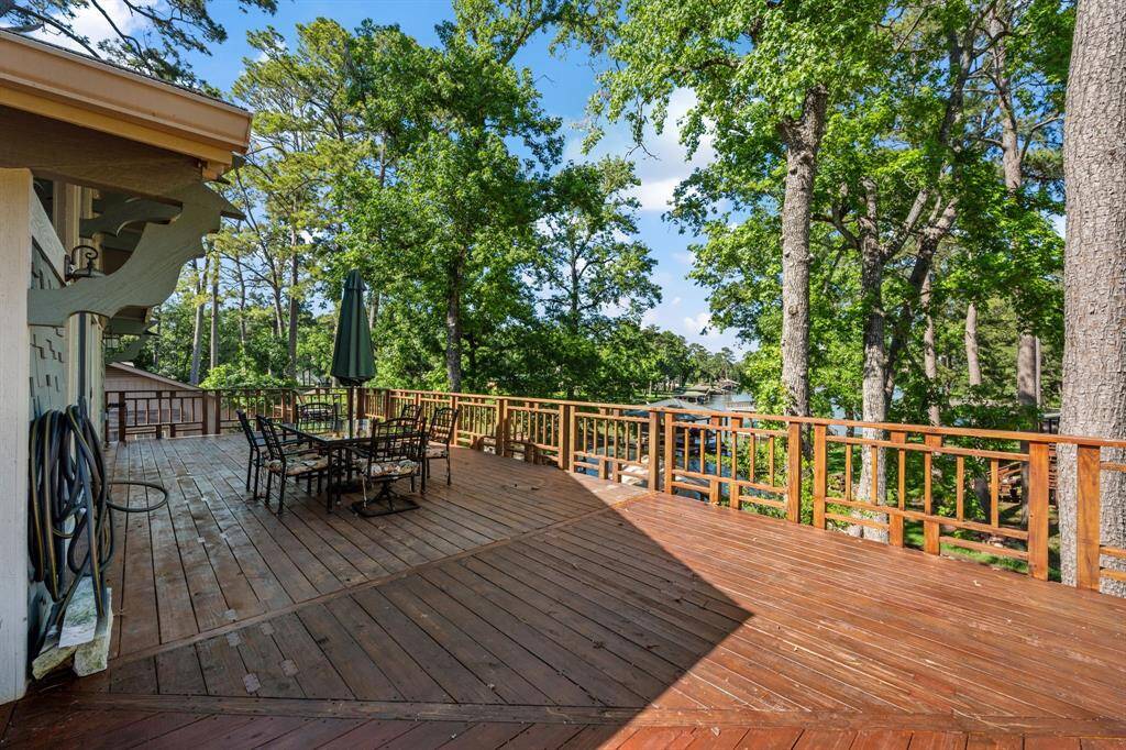 Rear area of the L shaped deck overlooks the water.