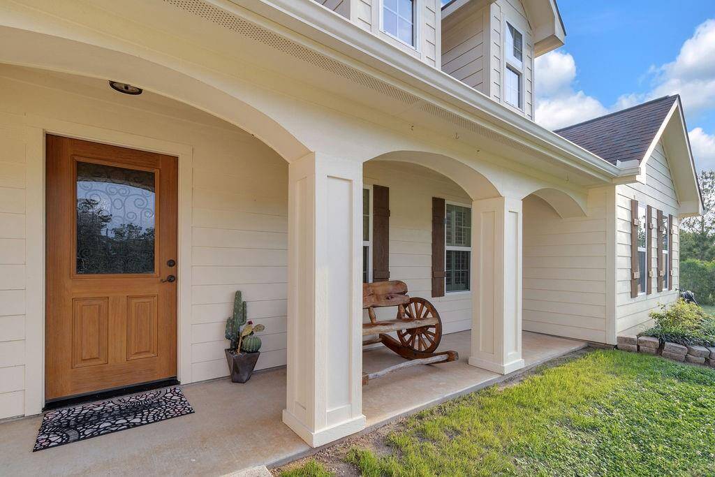 Covered Porch has room for a Swing