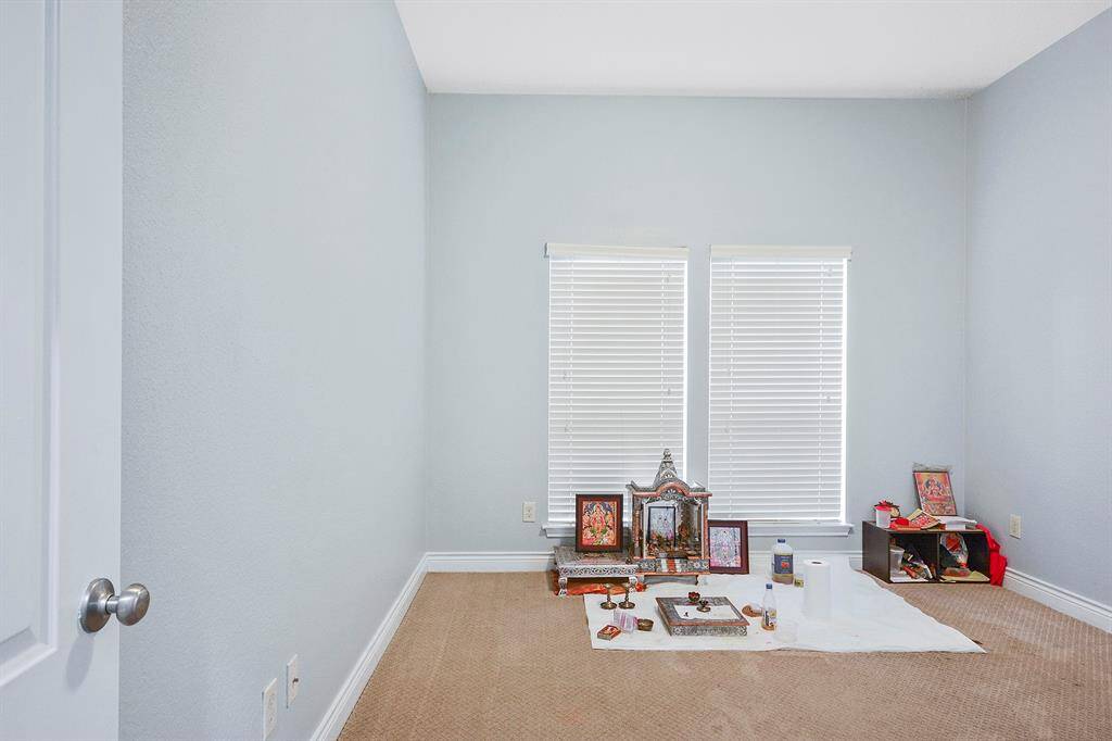 1 of 4 bedrooms Has a walk-in closet and nice window with treatment.