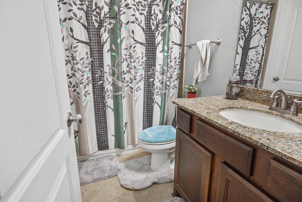 This home offers 3 full bathrooms and 1 half bathroom.