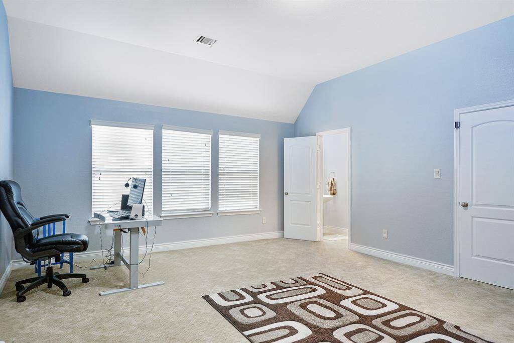 Another view of this HUGE game room. Door on the right are to the Powder room and media room.