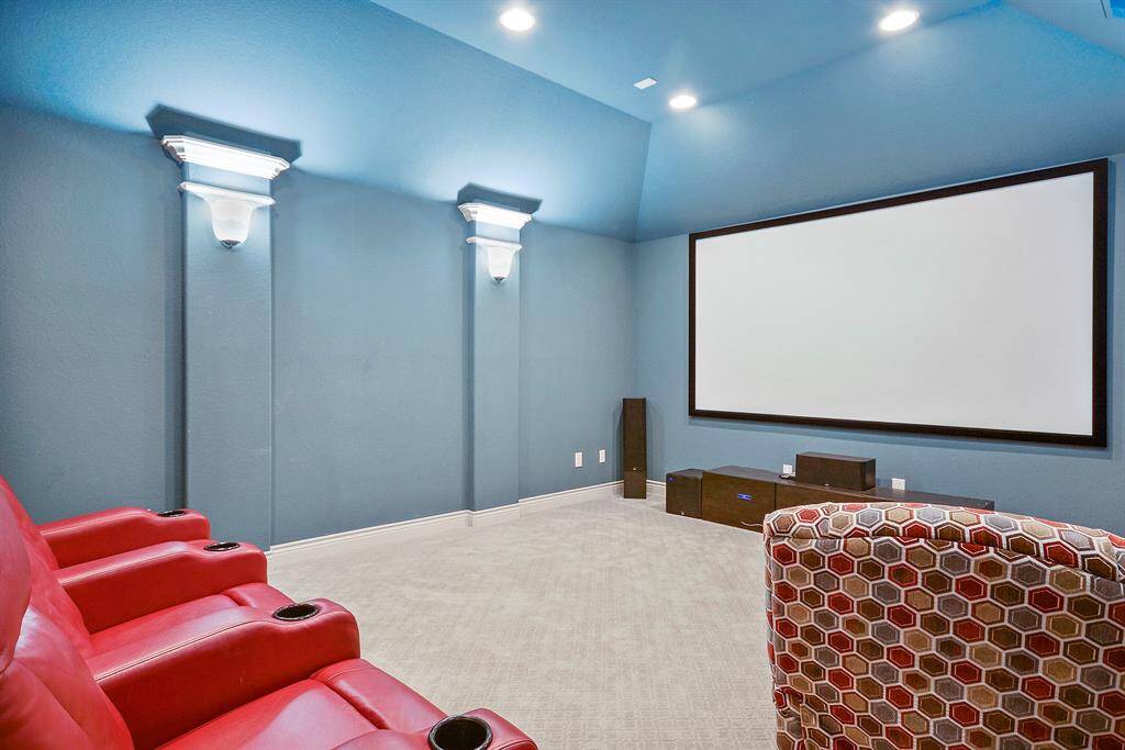 The Media Room is pre-wired for surround sound. Notice the sconce lighting on the walls.