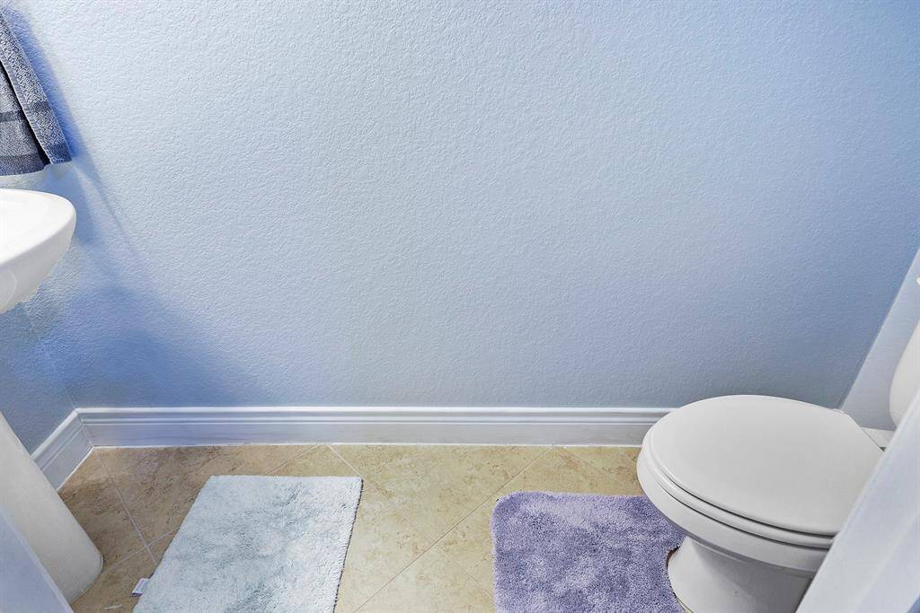 Upstairs Powder room for your guest, in a great location.