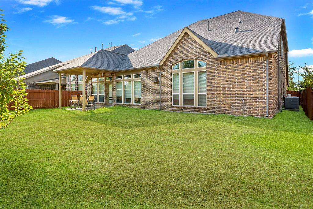 Notice their is brick on all 4 sides of this Home exterior. Spacious Backyard! Also has a good size covered Patio. A dream home!