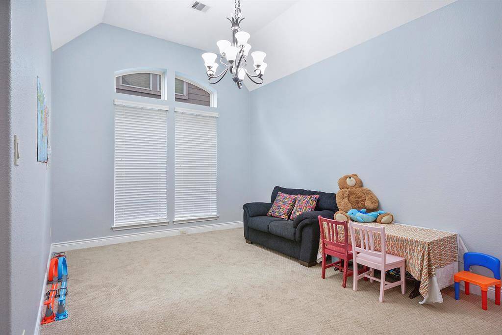 Another view of this spacious Formal Dining room that can fit an 8+ Dining table and more.