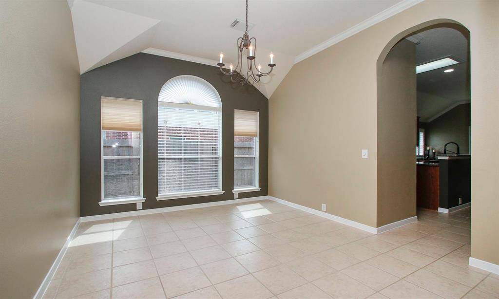 Enjoy dinner guests in this elegant formal dining RM situated just off the kitchen.