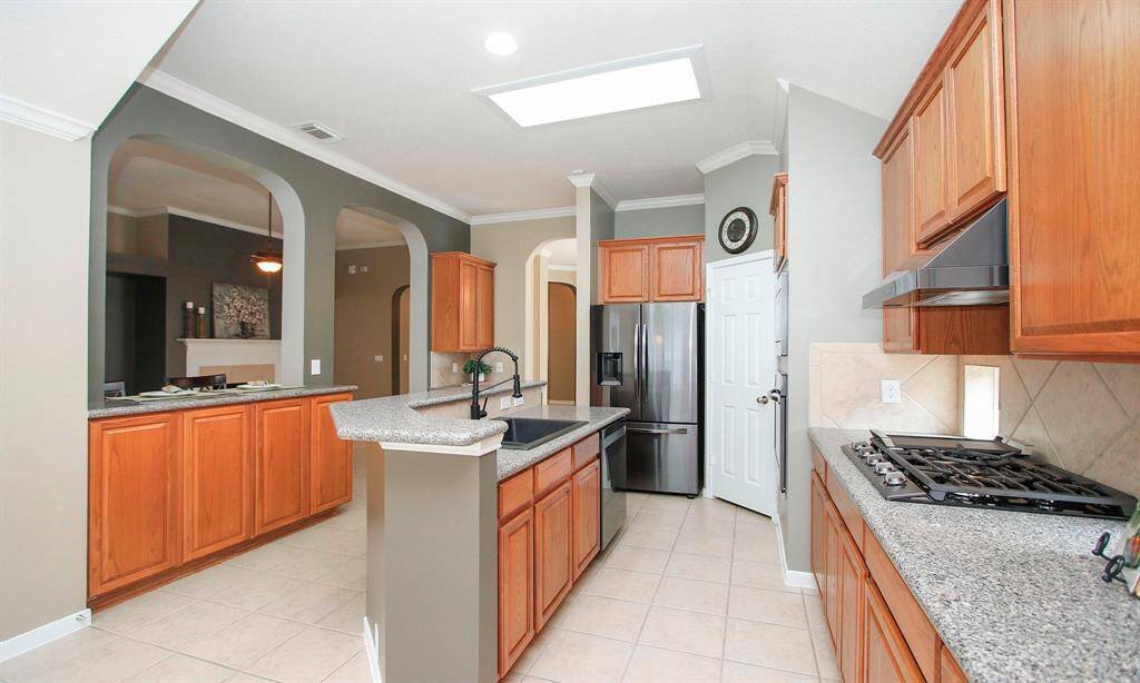 With an abundance of counter space, this kitchen provides plenty of prep space for any chef! Refrigerator included.