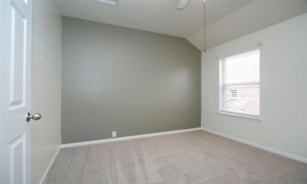 2nd bedroom. All bedrooms with recent carpet, vaulted ceilings, ceiling fans and large closets.