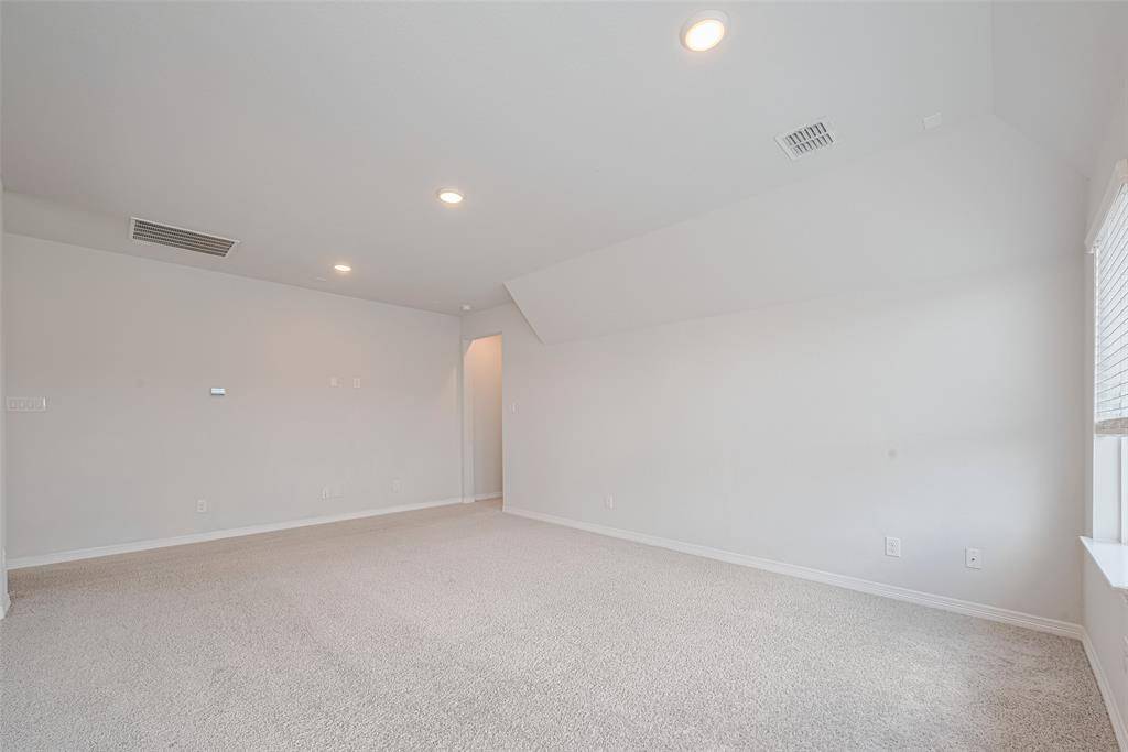 3rd bedroom upstairs with soft carpet and light colored paint sharing a bathroom with bedroom  # 4.