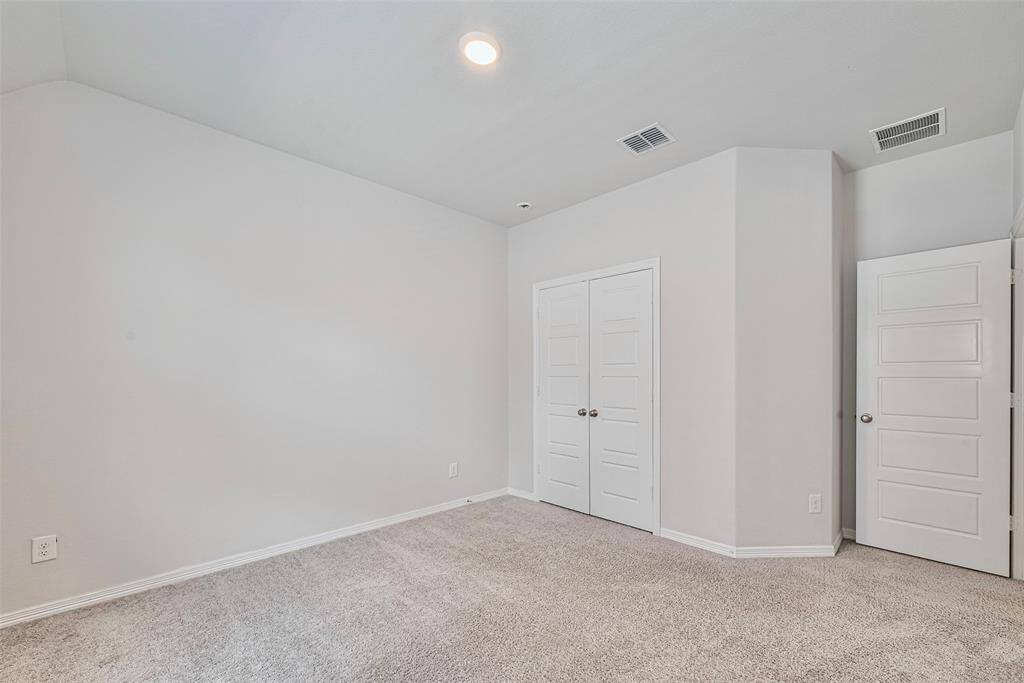 4th bedroom upstairs with soft carpet and light colored paint sharing a bathroom with bedroom  # 3.
