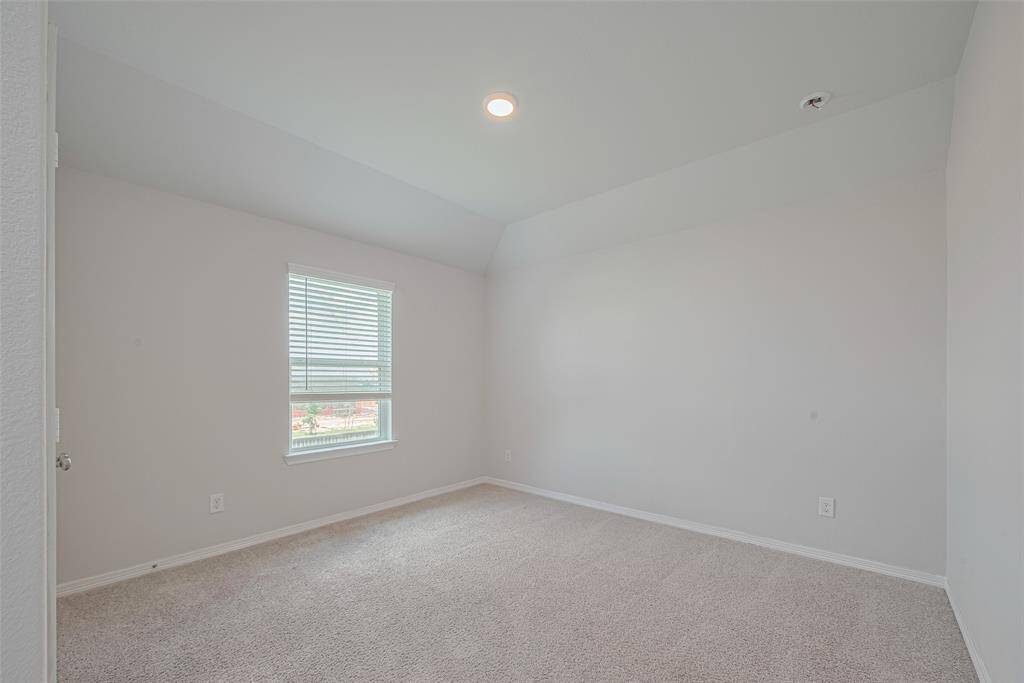 4th bedroom upstairs with soft carpet and light colored paint sharing a bathroom with bedroom  # 3.