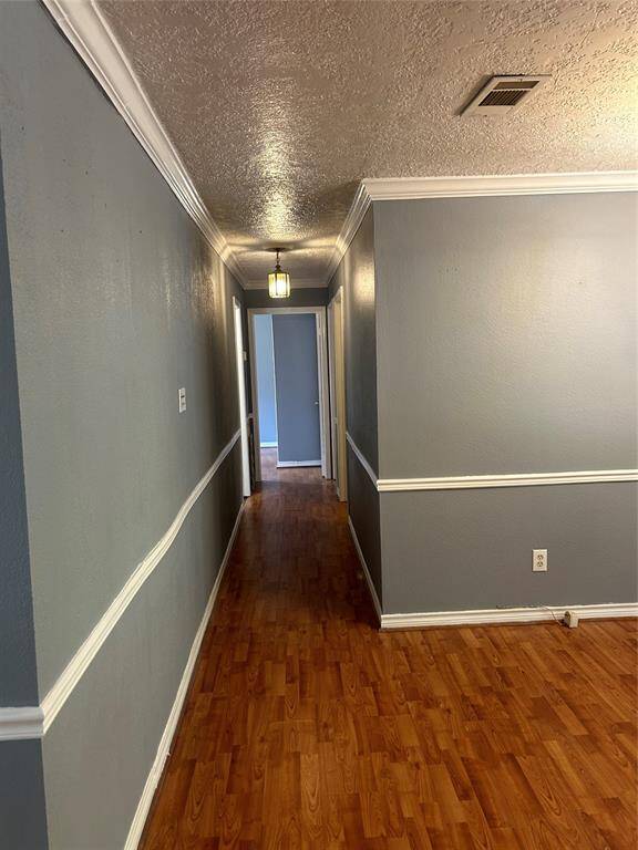Hallway leading to the 3 bedrooms and bathroom.