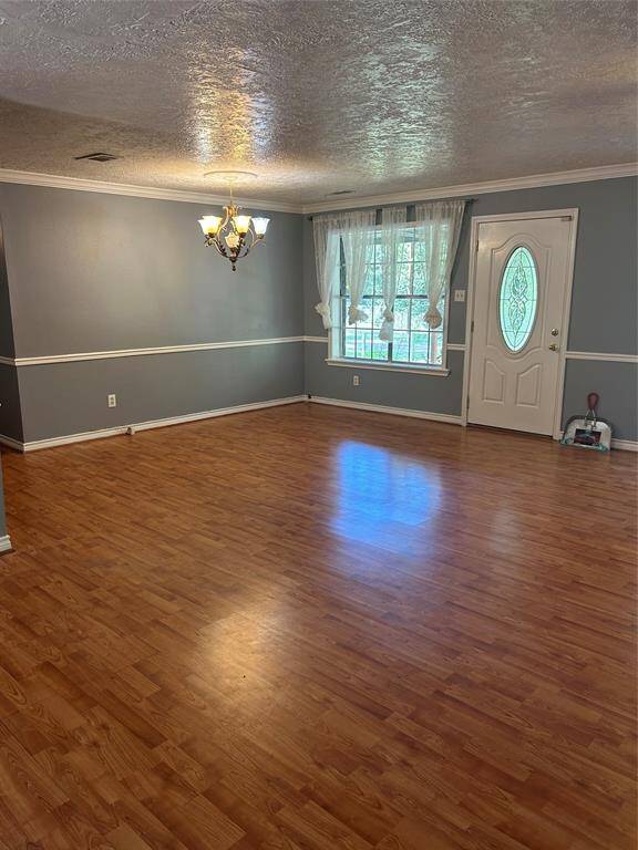 Front entry with formal dining room to the left.