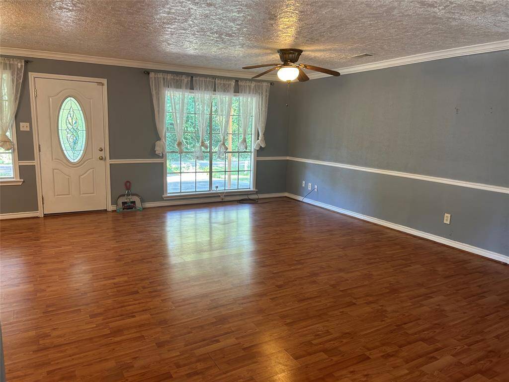 Front entry with living room to the right.