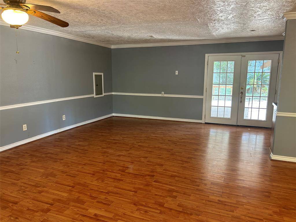 Picturing breakfast nook and French doors leading to the back patio.