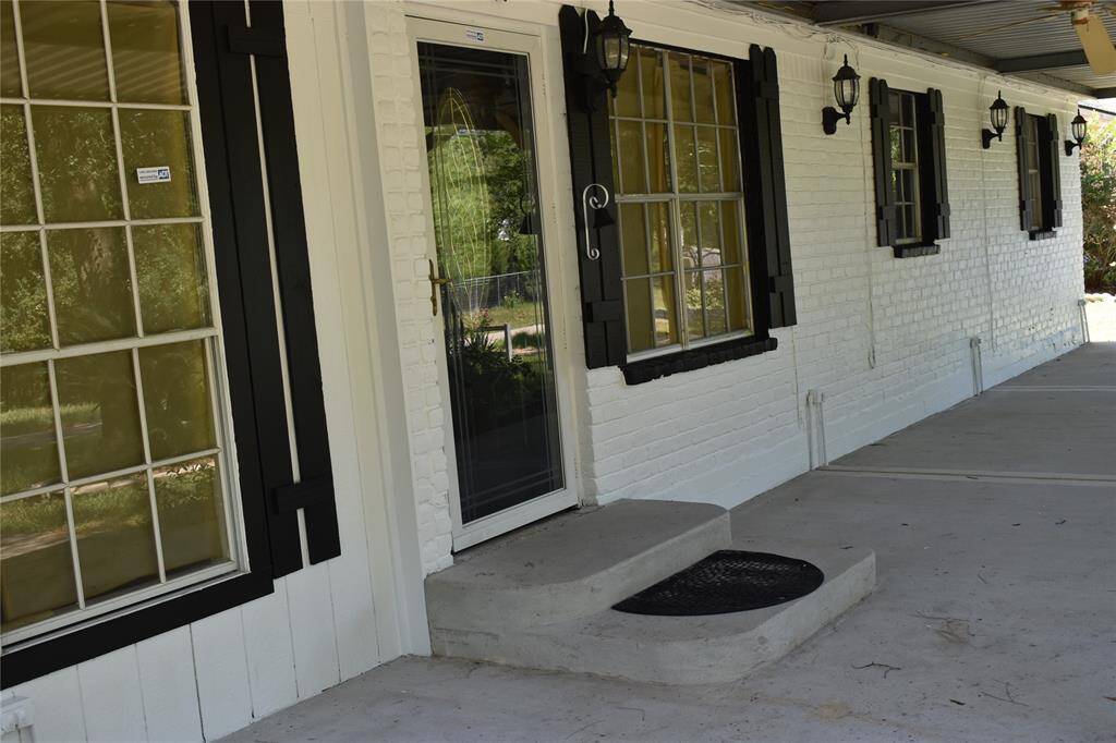 Enjoy your morning coffee on this oversized front porch.