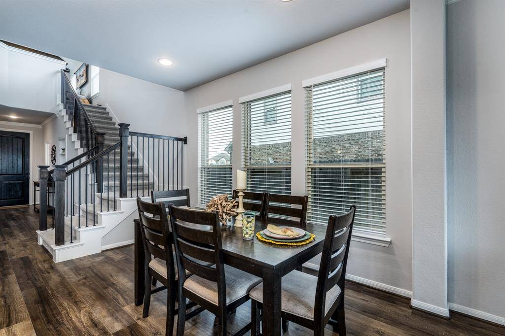 Tucked away just off the kitchen is this breakfast nook. Morning coffee taking in the sunlight in this space would be the ideal way to start your day!